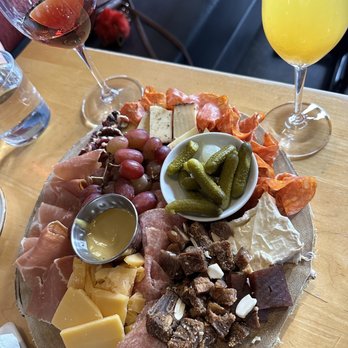 Camp 4  - Small Cheese & Charcuterie Board with fresh squeezed orange juice mimosa & I believe a sweet red - Wine Bars Near Me - Modesto, California