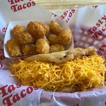 Tasty Tacos - Original Flour Taco (extra cheese for me) and Tasty Taters - Mexican Near Me - Des Moines, Iowa Tasty Tacos - Original Flour Taco (extra cheese for me) and Tasty Taters - Mexican Near Me - Des Moines, Iowa