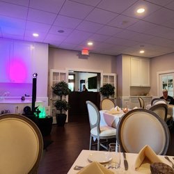 Bijou Garden Cafe - Interior central dining area.  Live music to the left.