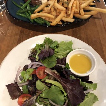 foothill - New York steak with green beans and garlic fries (so crispy, thick, and garlicky). House salad with side of orange vinaigrette dressing. - New American Near Me - Pasadena, California