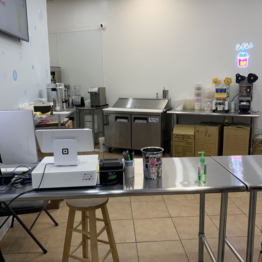Bubbles Tea & Dessert - a table with a laptop on it - Bubble Tea Near Me - Oakley, California Bubbles Tea & Dessert - a table with a laptop on it - Bubble Tea Near Me - Oakley, California