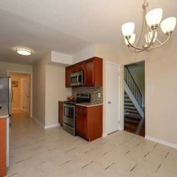 Global Home Decor - Cherry Cabinets and Desert Gold Granite by Global Home Decor.