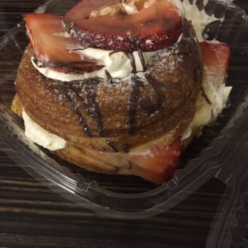 Sugarbox Donuts - Strawberry cronut moments before being devoured! - Donuts Near Me - Newbury Park, California Sugarbox Donuts - Strawberry cronut moments before being devoured! - Donuts Near Me - Newbury Park, California