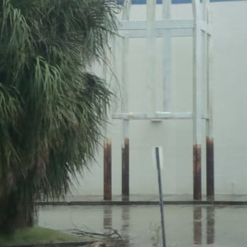 Gray Line New Orleans - Note the height of the rust on the poles marking the flood line - Tours Near Me - New Orleans, Louisiana Gray Line New Orleans - Note the height of the rust on the poles marking the flood line - Tours Near Me - New Orleans, Louisiana