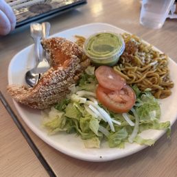 Salmon garlic noodle dish. The salmon is nice and crispy, a little bland but compliments well with the tasty garlic noodle and sauce.