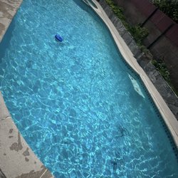 Top Pool Services - Chill vibes by the pool on a sunny day