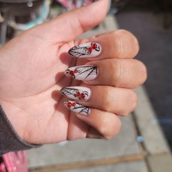 Halloween nails with spiders and spiderwebs
