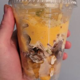 This is an 8-9 dollar cup with some fritos, 1-2 pieces of meat. A tablespoon of coleslaw and flavorless macaroni and I think cheese.