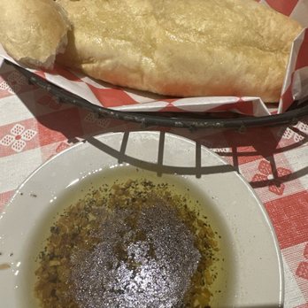 Johnny Carino's - hot bread and wonderfully spiced oil!! - Italian Near Me - El Paso, Texas Johnny Carino's - hot bread and wonderfully spiced oil!! - Italian Near Me - El Paso, Texas