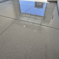 Armor Coatings - Double top coating garage floor in Shale Hybrid Stone color flake.