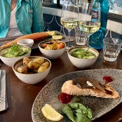 Seaside - Faroe Island Salmon, foreground; Trout, Background. With sides, seltzer, Sauvignon Blanc. Excellent!