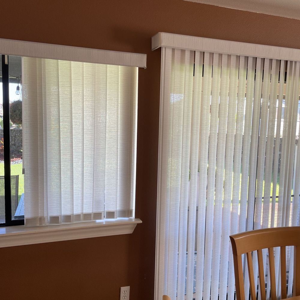 Fabric vertical blinds downstairs to allow for maximum light and natural ventilation. Fabric vertical blinds downstairs to allow for maximum light and natural ventilation.
