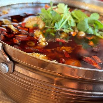 Bamboo House - a bowl of soup with a garnish on top - Chinese Near Me - Plano, Texas Bamboo House - a bowl of soup with a garnish on top - Chinese Near Me - Plano, Texas