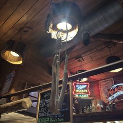 Exit Glacier Lodge - Bar area with Oosiks hanging from the light,lol