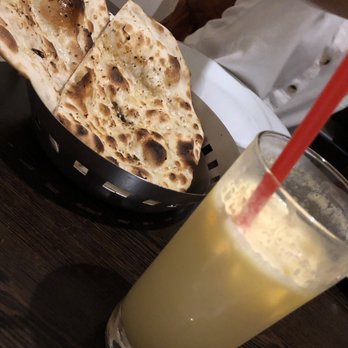 Masala - Naan and mango lassi (mango yoghurt smoothie) - Indian Near Me - Prague, Puerto Rico