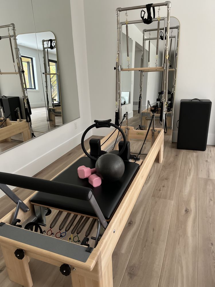 Total Package Pilates and Wellness Logo