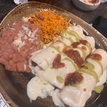 Cantina Laredo - Chicken enchiladas and whatever my husband got - Mexican Near Me - Sandestin, Florida Cantina Laredo - Chicken enchiladas and whatever my husband got - Mexican Near Me - Sandestin, Florida