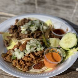 Rio Grande Tacos - Spicy pork taco and steak taco. Green salsa is legit. Best street tacos in PC