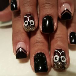 Tutti Nail & Spa - They never seem to fail me. All of their nail techs are on point. I asked and I received. Beautiful work of art by Michelle.  Thank you.