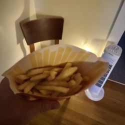 McDonald's - Actual fries in a large fry, this is COMPLETELY typical from this location... a total rip off.  And no, there were no fries in the bag.