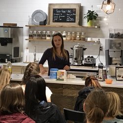 Purearth Organics - Madeline McKinnon teaching her women's hormones class.