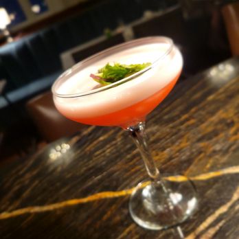 The Hackney - a pink cocktail in a coupe glass - New American Near Me - Washington, North Carolina The Hackney - a pink cocktail in a coupe glass - New American Near Me - Washington, North Carolina