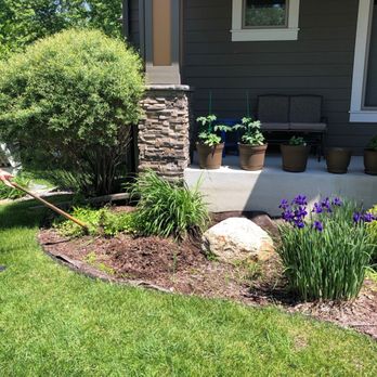 All Over Elementz Outdoor Services - a man mowing the lawn - Snow Removal Near Me