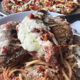 Eggplant Parmesan and Extra Thin Pete's Special Pizza. Eggplant Parmesan and Extra Thin Pete's Special Pizza.