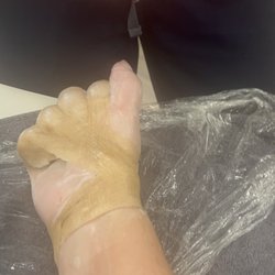 Lang Hand Therapy - Binding into fist, dip in wax, remain under protective layers and heat