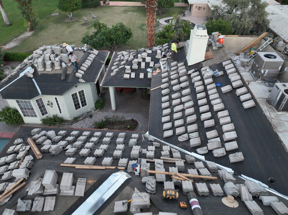 Slide of First Division Roofing