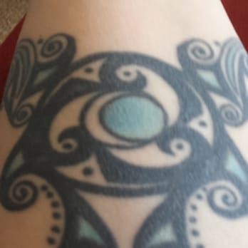 Imperial Tattoo - Lunar Waves...Celtics in style. Inner arm...band (cuff) wraps around my arm..This tattoo was done in like 2004..or 5. - Tattoo Near Me - Portland, Oregon Imperial Tattoo - Lunar Waves...Celtics in style. Inner arm...band (cuff) wraps around my arm..This tattoo was done in like 2004..or 5. - Tattoo Near Me - Portland, Oregon