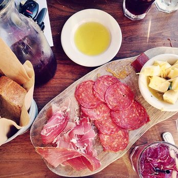Barcelona Reston - Charcuterie board with jamon serrano, chorizo de soria, marinated mahon - Tapas/Small Plates Near Me - Reston, Virginia