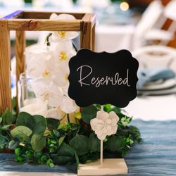 Cornerstone Ranch Event Center - Indoor wedding reception tables and decor