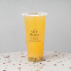 Brighten your day with our Sunshine Passion Tea - a vibrant mix of tangy passion fruit and sweet mango, blended with Magic Green Tea for a r