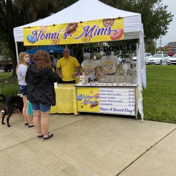 Nonni’s Minis - a vendor at a food stand - Donuts Near Me