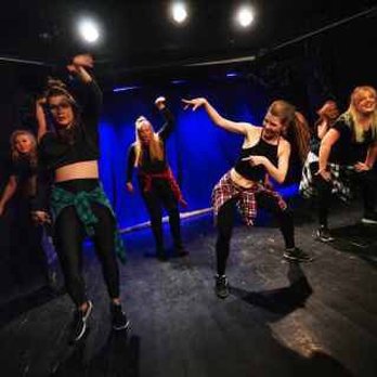 Danskollektivet - A pic from a student show with afro dancehall students - Dance Studios Near Me - Stockholm, Alberta
