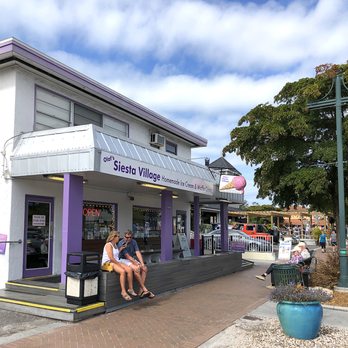 Olaf's Siesta Village - two women sitting on a bench - Ice Cream & Frozen Yogurt Near Me - Siesta Key, Florida Olaf's Siesta Village - two women sitting on a bench - Ice Cream & Frozen Yogurt Near Me - Siesta Key, Florida