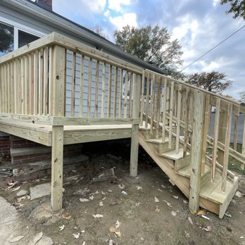 Walo Construction - Deck all finished up with a slight tilt to let the water flow off - Handyman Near Me Walo Construction - Deck all finished up with a slight tilt to let the water flow off - Handyman Near Me