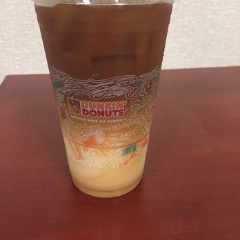 Dunkin' - a cup of iced coffee on a table - Coffee & Tea Near Me - Rahway, New Jersey Dunkin' - a cup of iced coffee on a table - Coffee & Tea Near Me - Rahway, New Jersey