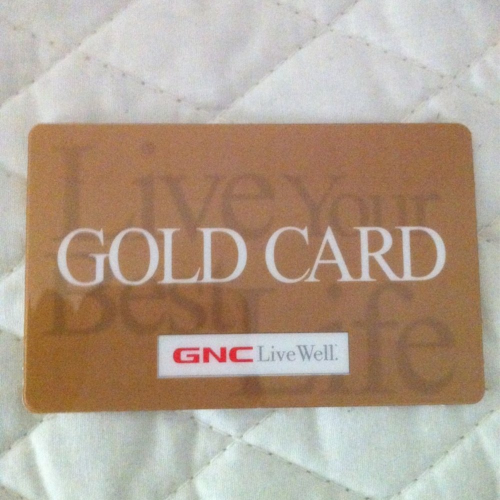 GNC - a gold card sitting on a bed - Health Markets Near Me - Hilo, Hawaii GNC - a gold card sitting on a bed - Health Markets Near Me - Hilo, Hawaii