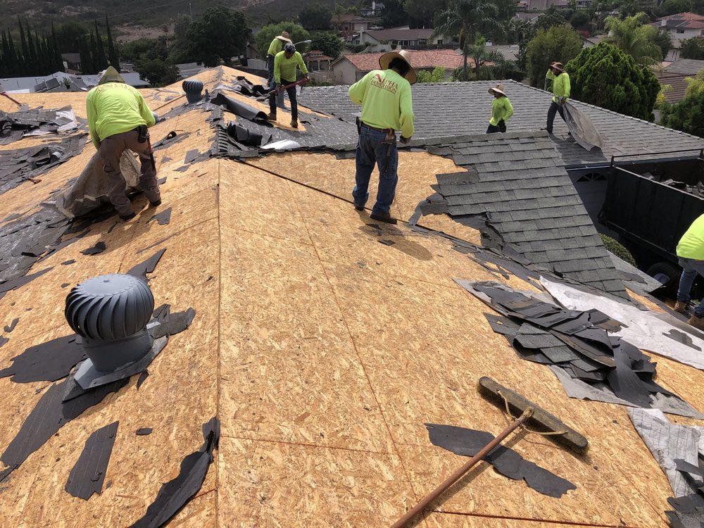 Slide of Escamilla’s Roofing and Rain Gutters