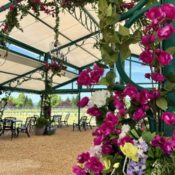 Domaine Fortier Vineyards - Lavishly decorated outdoor pavilion with ample seating and beautiful views.
