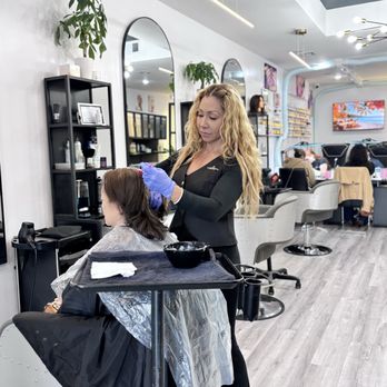 Transformation Beauty Salon - Transforming a hair color from dark brown to a medium blonde. - Hair Salons Near Me - Union City, New Jersey Transformation Beauty Salon - Transforming a hair color from dark brown to a medium blonde. - Hair Salons Near Me - Union City, New Jersey