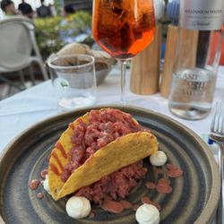 Torre Aurora - A disgusting presentation of beef tartare in a taco shell