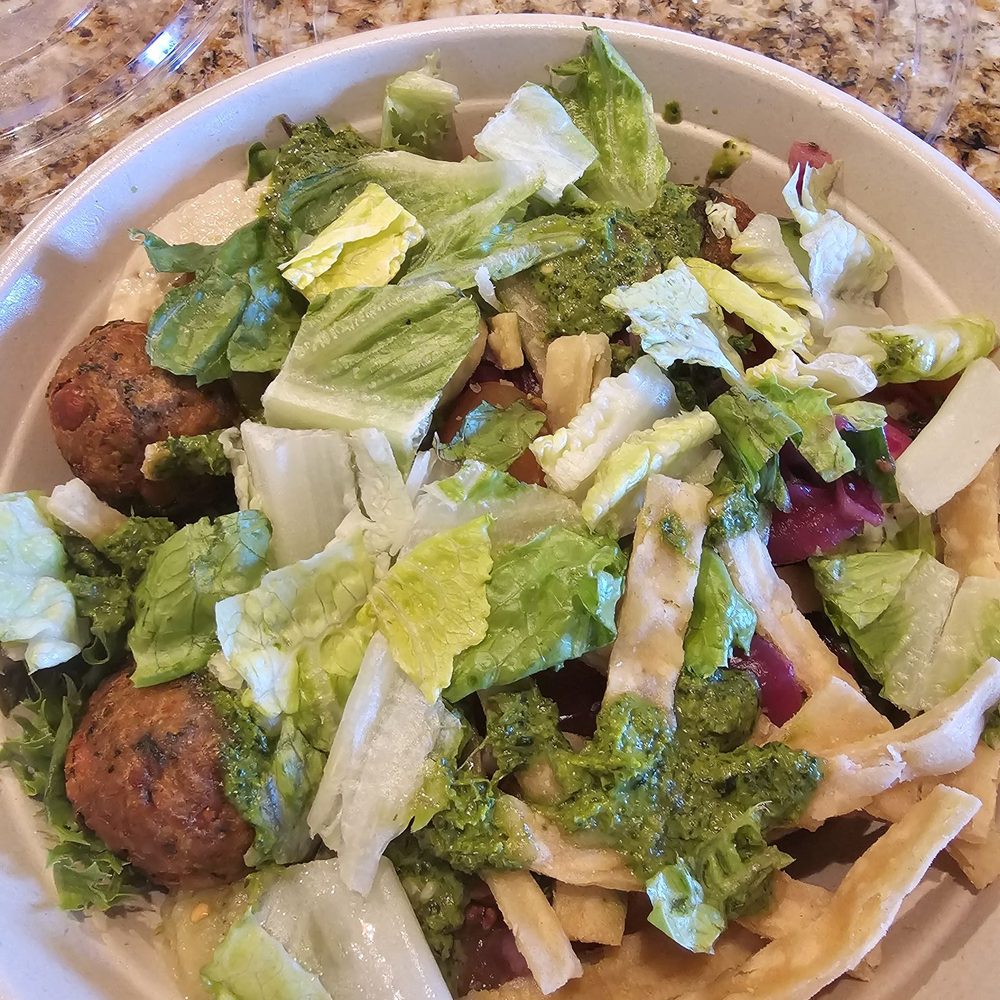 Falafel bowl with half rice and half greens Falafel bowl with half rice and half greens