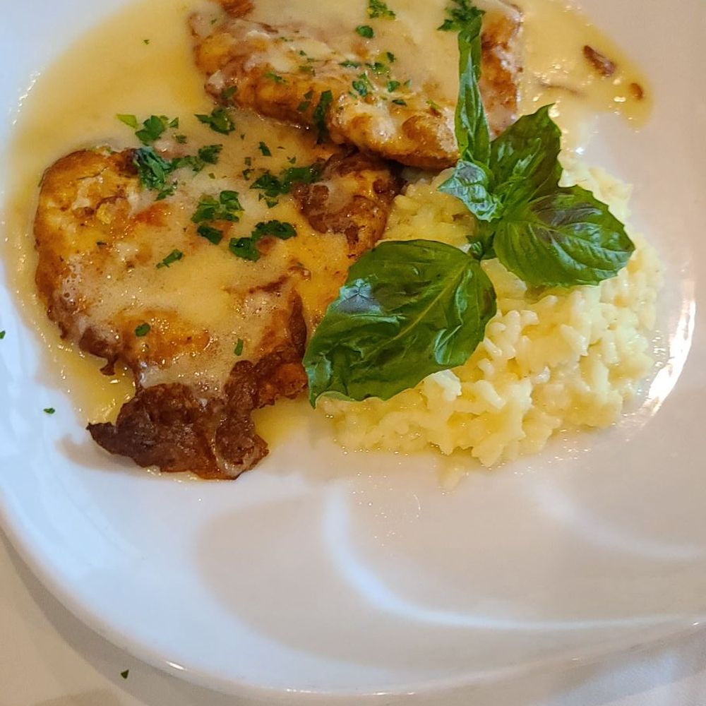 Poppys Italiano - Chicken parm with rizzoto - Italian Near Me - St. Augustine, Florida Poppys Italiano - Chicken parm with rizzoto - Italian Near Me - St. Augustine, Florida
