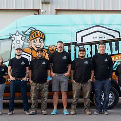 Unrivaled Plumbing & Heating - Unrivaled Team in front of Unrivaled P & H Van