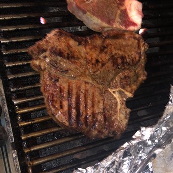The Blue Store - two steaks cooking on a grill - Grocery Near Me - Richmond, California The Blue Store - two steaks cooking on a grill - Grocery Near Me - Richmond, California