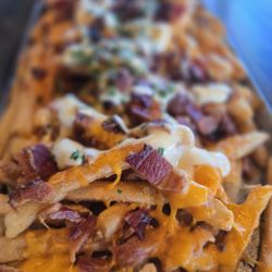 Twisted Tavern - Twisted fries with cheese and bacon.