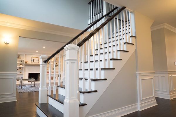 Living Room + Stairs/Railing - As general contractors, one would be hard-pressed to find a team so diverse yet so well balanced in age and experience. Both Sal and John come from generations of hard-working construction oriented families who worked building downtown New York City, The WorldTrade Center and the New York Mets Citi Field. Their current team has over 50 years of combined work experience in the business. Craftsmanship is the forte of this team but never discount their design talents. Living Room + Stairs/Railing - As general contractors, one would be hard-pressed to find a team so diverse yet so well balanced in age and experience. Both Sal and John come from generations of hard-working construction oriented families who worked building downtown New York City, The WorldTrade Center and the New York Mets Citi Field. Their current team has over 50 years of combined work experience in the business. Craftsmanship is the forte of this team but never discount their design talents.